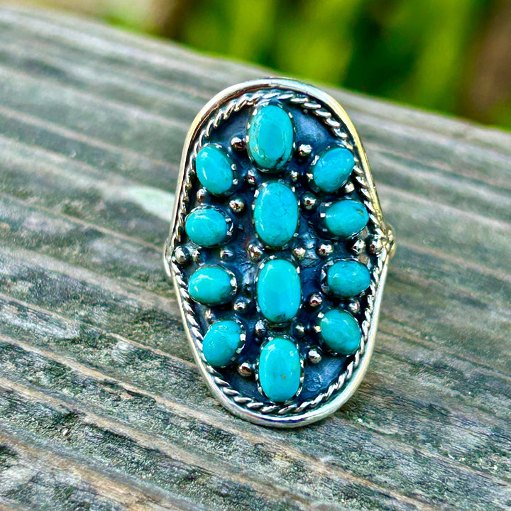 Turquoise Cluster Ring: Southwestern Sterling Silver Saddleback Design