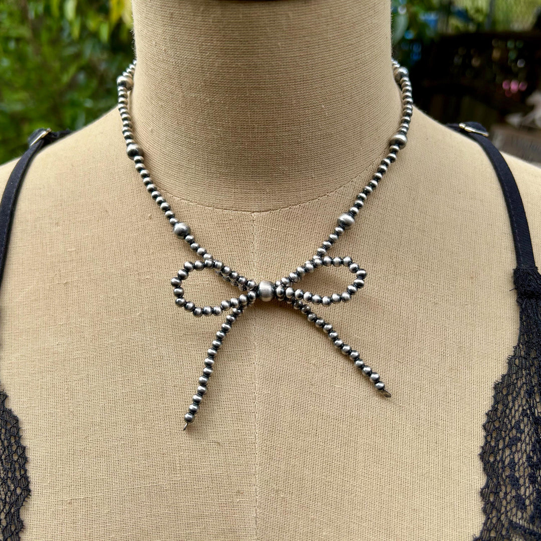 Sterling Silver Bow Necklace: Sterling Silver, Handmade