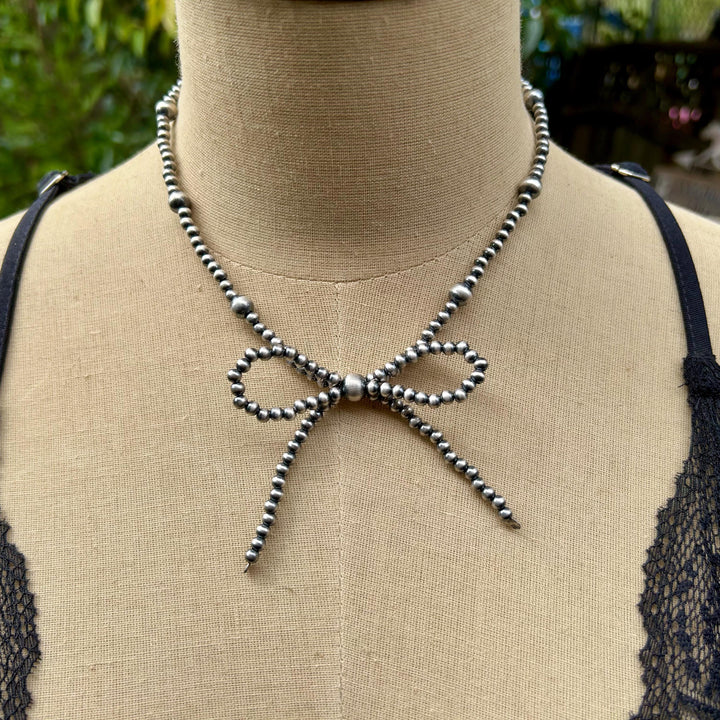 Sterling Silver Bow Necklace: Sterling Silver, Handmade