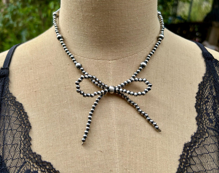 Sterling Silver Bow Necklace: Sterling Silver, Handmade