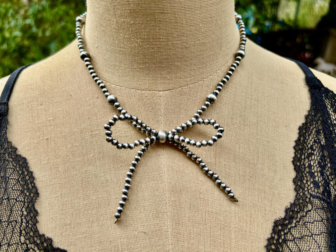 Sterling Silver Bow Necklace: Sterling Silver, Handmade