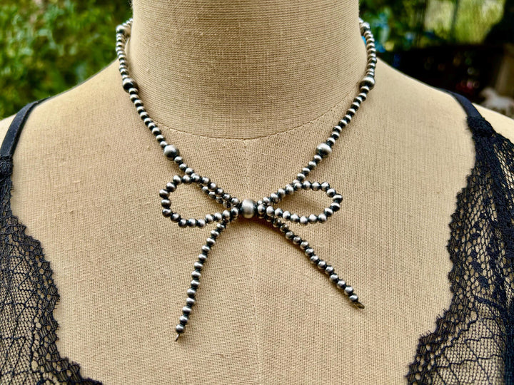Sterling Silver Bow Necklace: Sterling Silver, Handmade