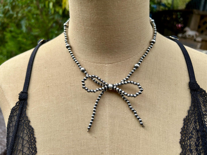 Sterling Silver Bow Necklace: Sterling Silver, Handmade
